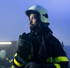 Man in a firesuit.